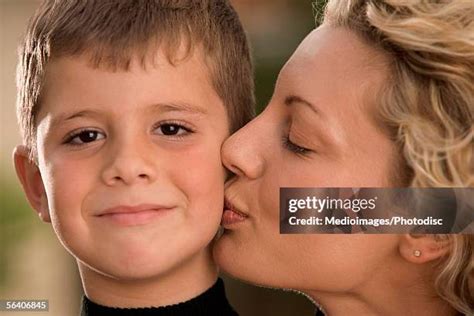 9,387 Mother And Son Kiss Stock Photos & High